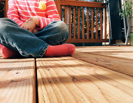 Picture of Child Sitting on Deck 2